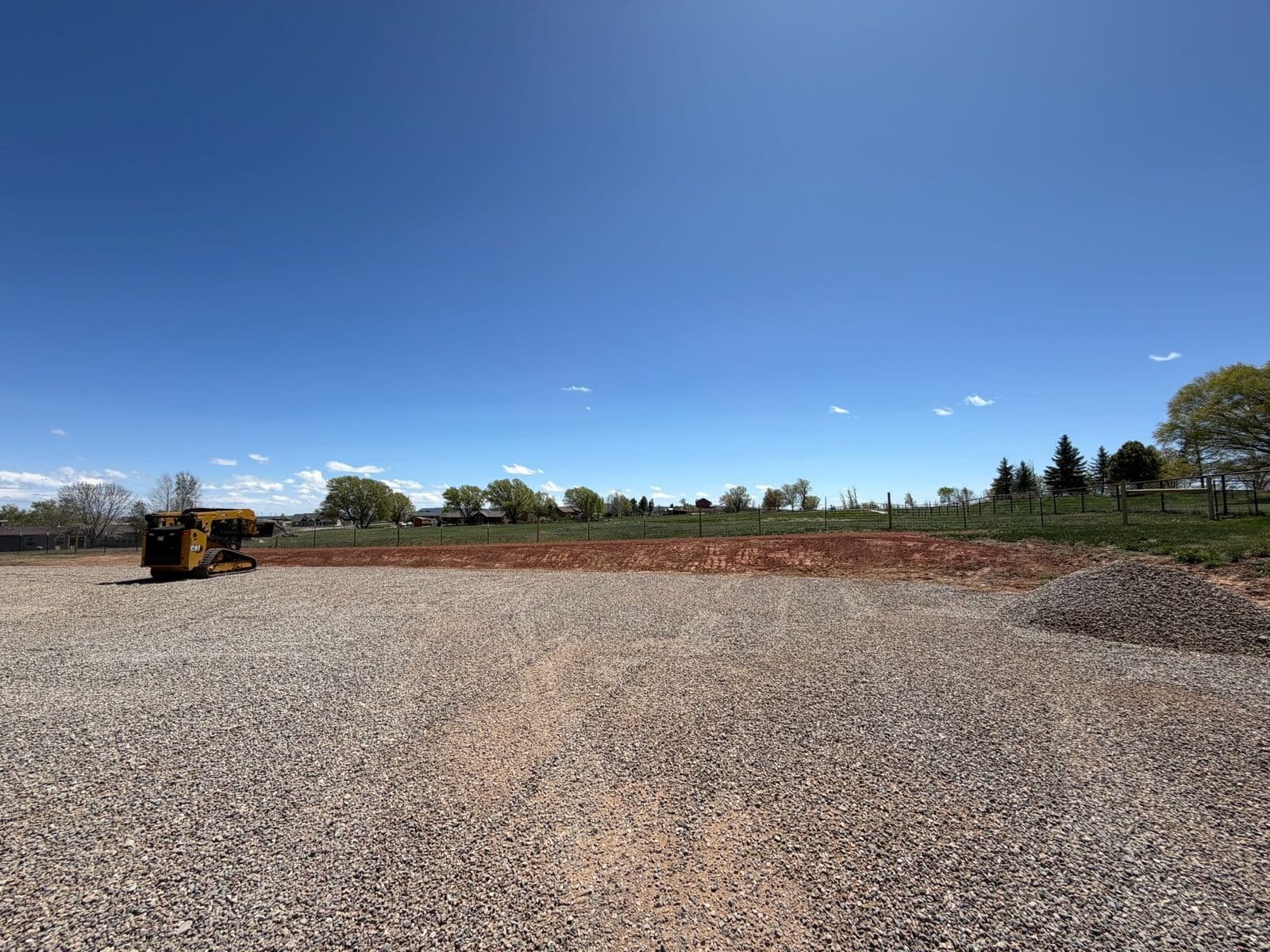 Gravel building pad and site preparation with heavy equipment in Durango, Colorado