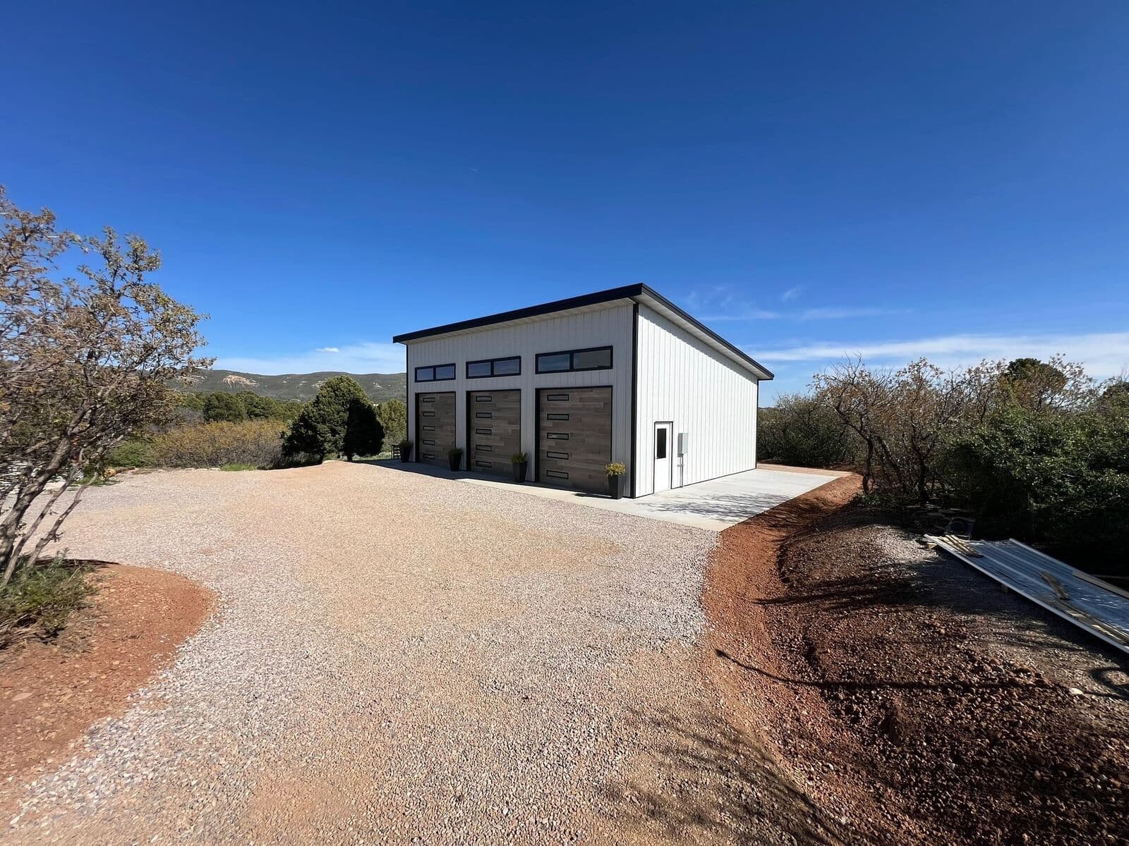 Gravel driveway and grading at a new shop building in Durango, Colorado