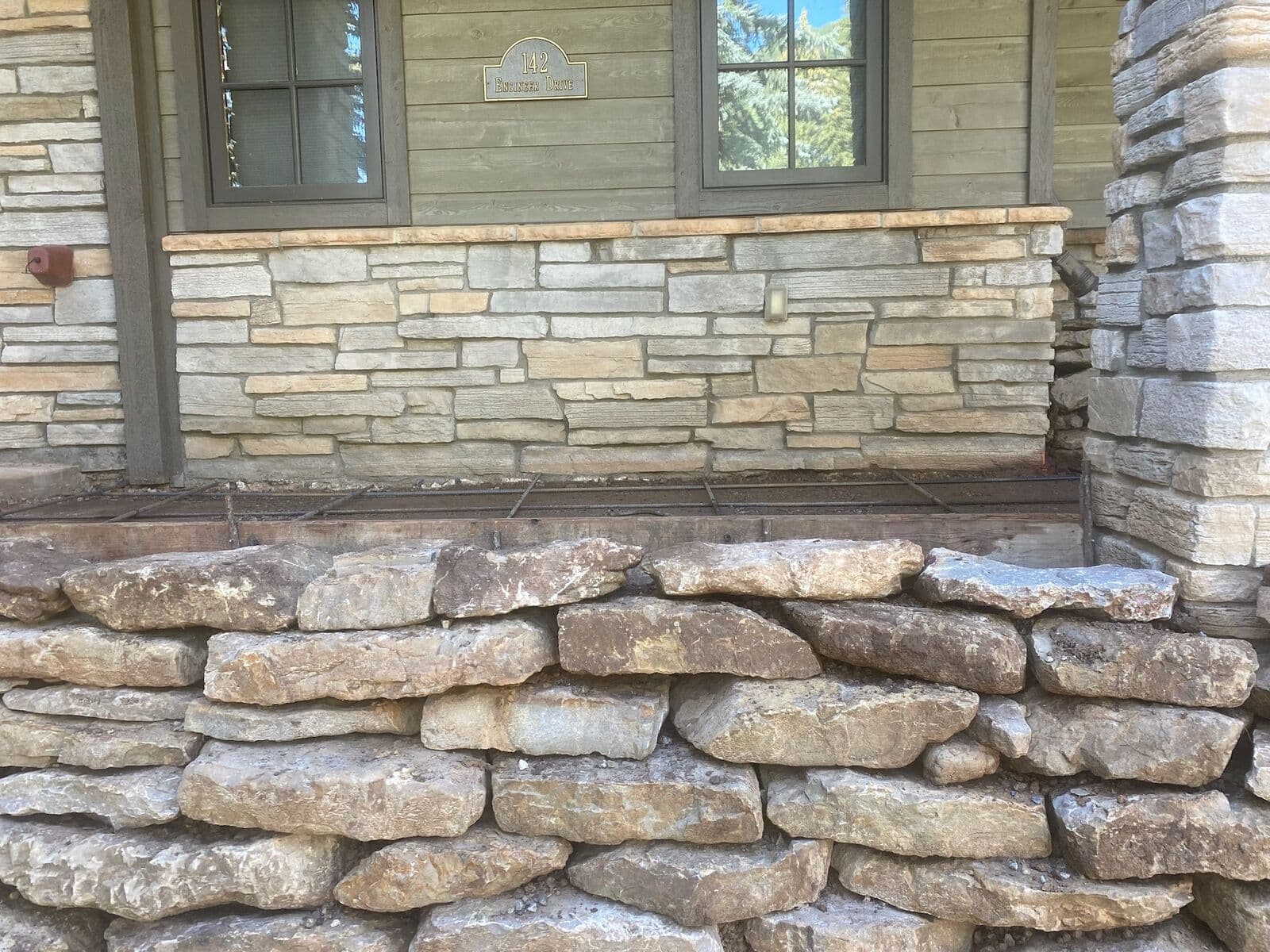Natural stacked stone porch wall at a custom home in Durango, Colorado